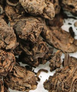 фото - пуэрные головы. Ферментация 2005г упакован 2018г пачка 150г